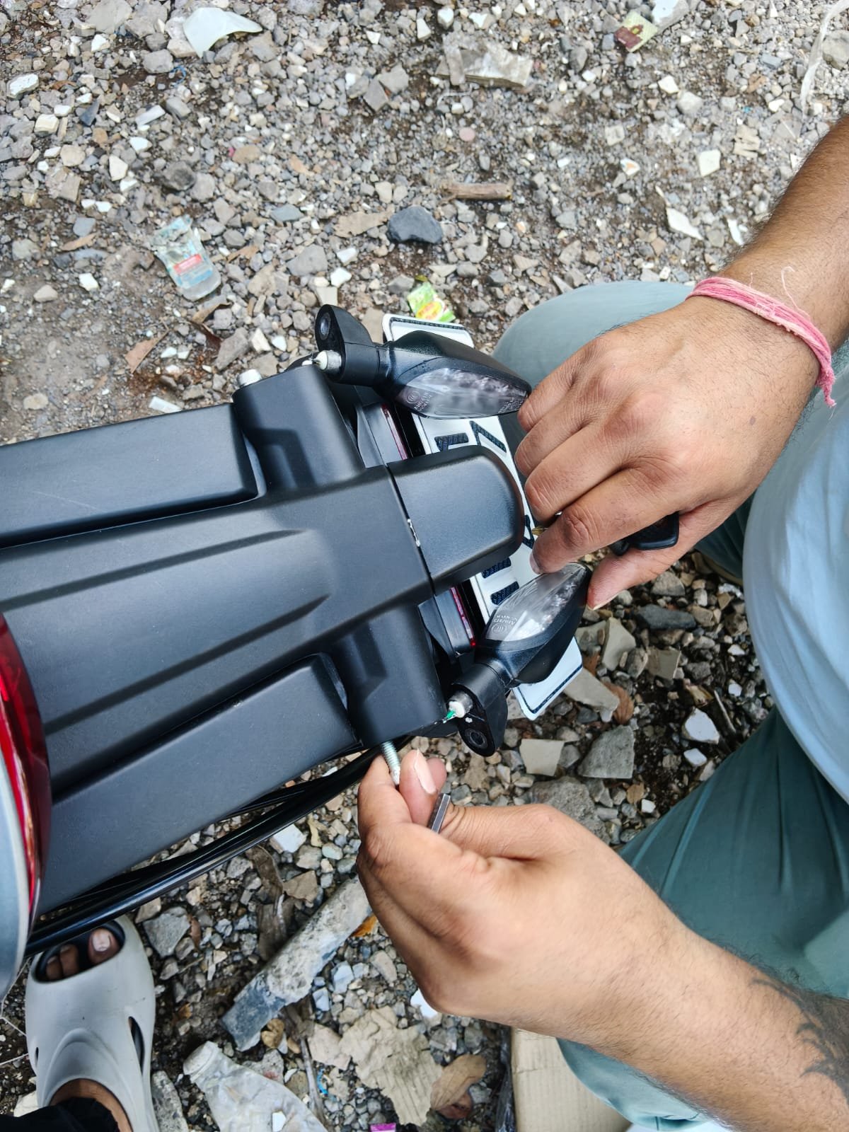 Proactive Indicator Loosening and Component Protection for Street Bikes
